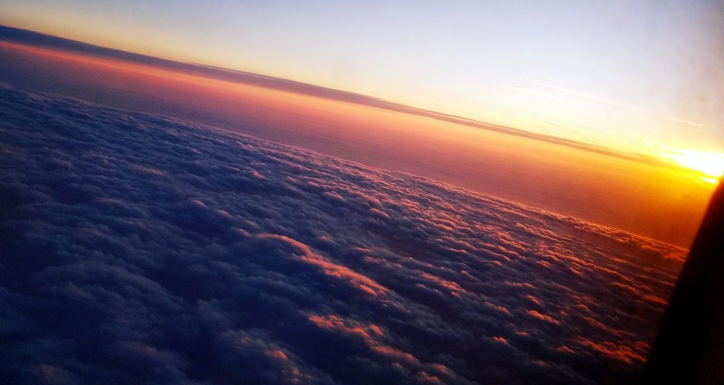 Východ slnka z lietadla